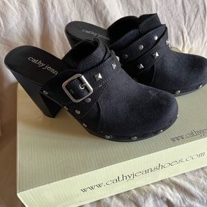 Cathy Jeans clogs. 4 inch heel with black suede and belts and buckles size 7